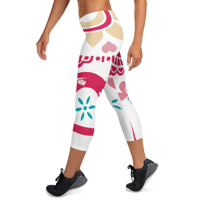 Woman wearing colorful Capri-Leggings N°4 with abstract pattern, showcasing stretch and comfort features.