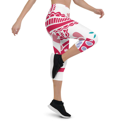 Model wearing Capri-Leggings N°4 in vibrant pattern, showcasing super soft and comfortable fabric with UV protection and four-way stretch.
