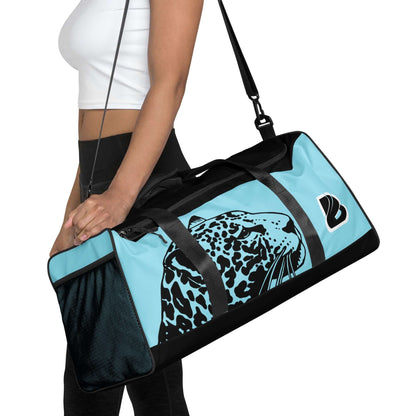 Woman carrying stylish Weekender N°27 bag with animal print design.