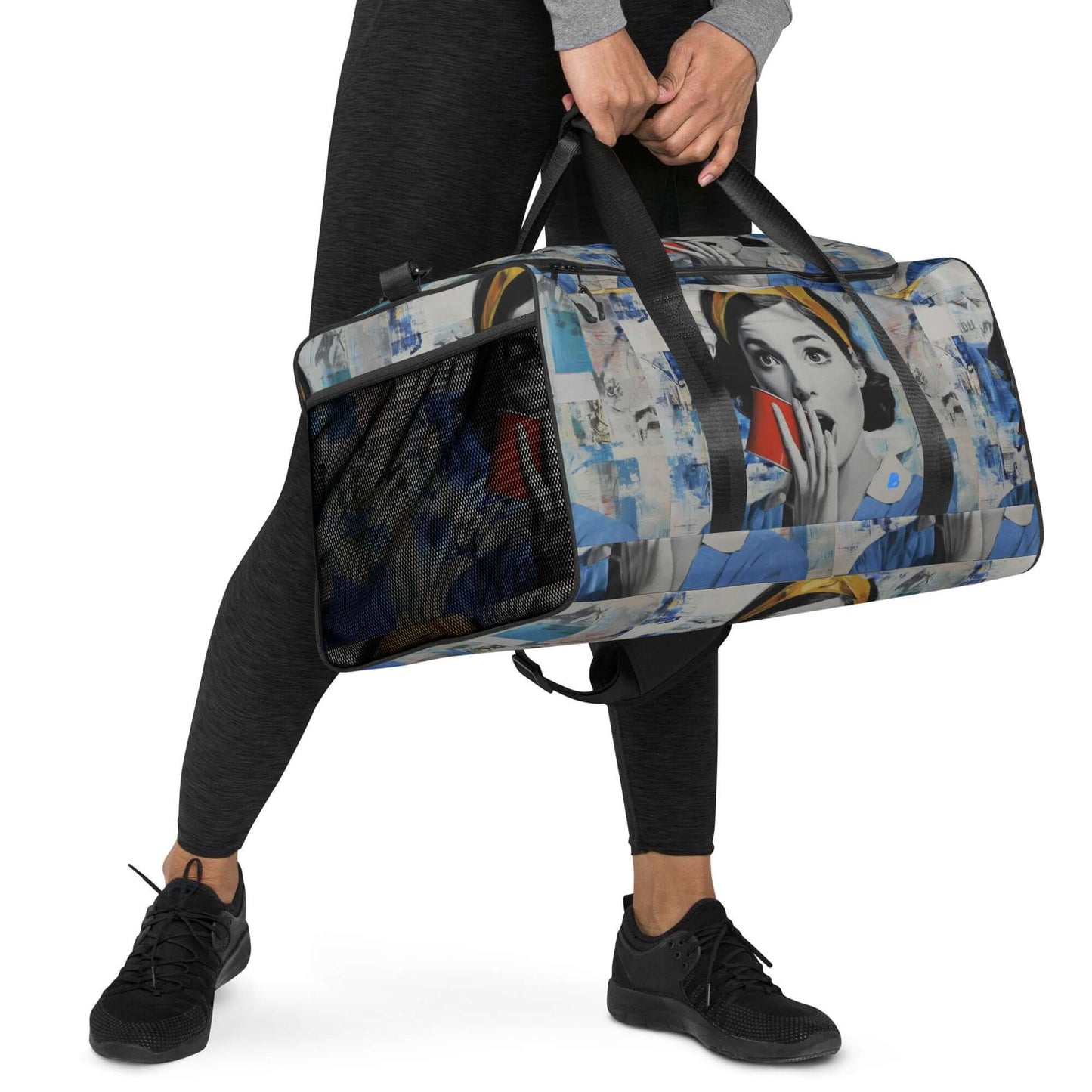 Person holding a stylish Weekender bag with graphic design, ideal for travel, errands, or gym, featuring multiple pockets and adjustable straps.