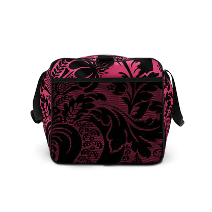Weekender N°29 in pink and black floral design with adjustable padded shoulder straps, ideal for travel or gym use.