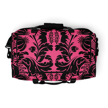 Weekender N°29 in pink with black floral pattern, versatile travel or gym bag with adjustable padded shoulder straps and ample storage.