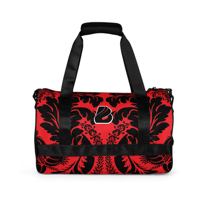Allover-Print-Sporttasche N°5 in red and black design, featuring durable, waterproof fabric, ideal for fitness and training with multiple pockets.