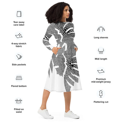 Langärmliges Midikleid mit Allover-Druck N°4 mit Seitenansicht, die flared Unterteil und Taschen zeigt, ideal für bequemen und femininen Stil.