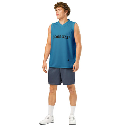 Man wearing a blue premium basketball jersey and gray shorts, showcasing athletic streetwear style and unisex design.