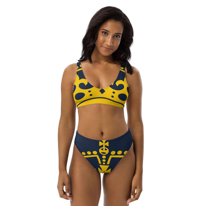 Model wearing Recycelter Allover High Waist Bikini N°1 with a blue and yellow pattern, sustainable swimwear option.