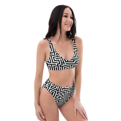 Woman wearing Recycelter Allover High Waist Bikini N°2 with geometric pattern, featuring recycled polyester and removable padding.