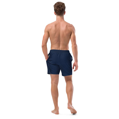 Man wearing Recycelte Schwimmshorts in navy blue, showcasing quick-dry and breathable features from the back view.