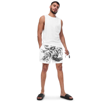 Man wearing Herren-Badehosen N°12 swim shorts with stylish design, perfect for summer.