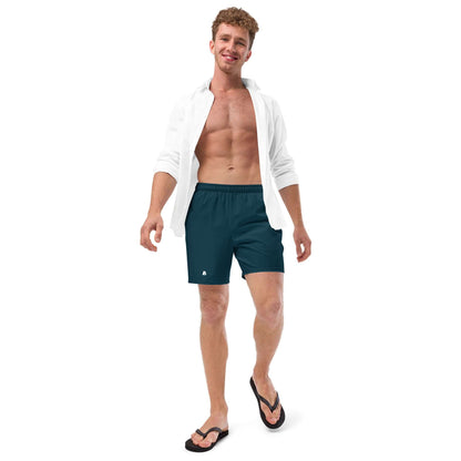 Man wearing Herren-Badehosen N°15, stylish swim trunks with quick-dry material and pockets, ideal for summer.