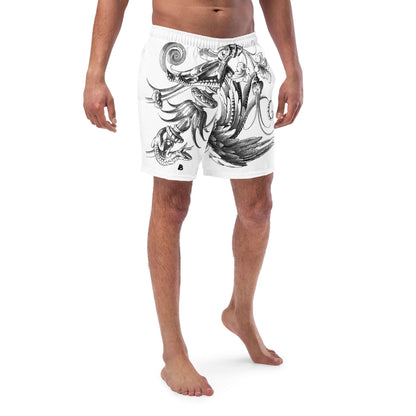 Man wearing Herren-Badehosen N°12, white with black artistic design, showcasing breathable and quick-dry fabric, perfect for summer.