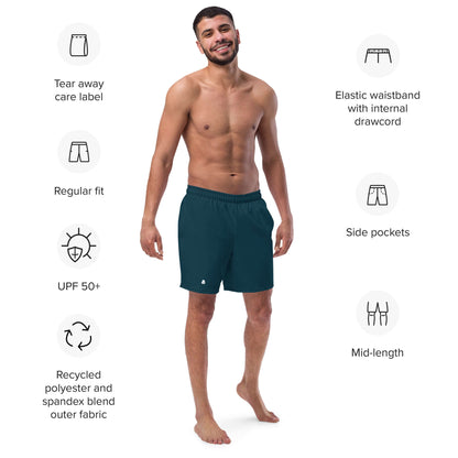 Man wearing Herren-Badehosen N°15 with details like elastic waistband, side pockets, and recycled polyester fabric.