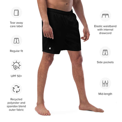 Man wearing Herren-Badehosen N°11 featuring elastic waistband, quick-dry fabric, side pockets, and UPF 50+ protection.