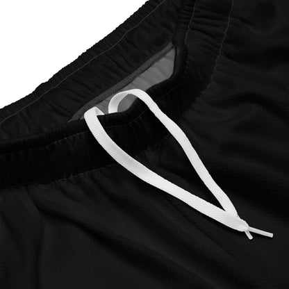 Close-up of Unisex Mesh-Shorts N°0 with drawstring, showcasing black recycled polyester fabric and comfortable waist design.
