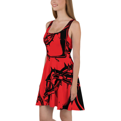 Woman wearing sleeveless red Skater-Kleid N°8 with graphic design and flared skirt.