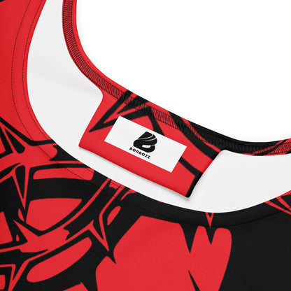 Close-up of a red and black sleeveless Skater-Kleid N°8 with intricate design and fabric label, featuring soft and elastic material.