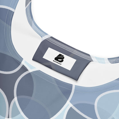 Detail of Skater-Kleid N°9 showing tag and smooth fabric with elegant design in soft tones.