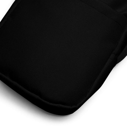 Close-up view of Nützliche Umhängetasche N°0 showing durable black polyester fabric