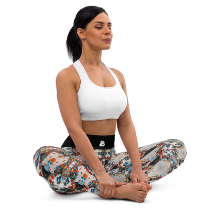 Woman wearing Yoga-Leggings N°47 with colorful pattern, sitting in a yoga pose, demonstrating comfort and stretch.