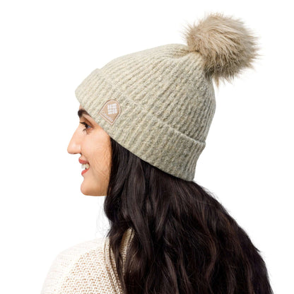 Columbia Bommelmütze mit Kunstfaser-Bommel und weichem Microfleece-Futter, ideal für stilvolle und warme Wintertage.