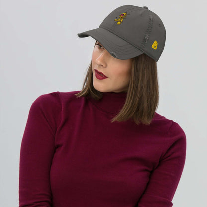 Woman wearing Dad-Hat im Used-Look N°1 with cartoon motif, adds style to casual outfits.
