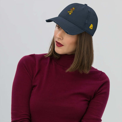 Woman wearing a dark Dad-Hat im Used-Look N°1 with a maroon turtleneck, showcasing casual style.