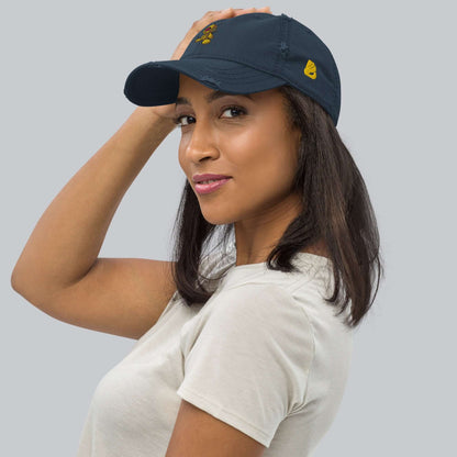 Woman wearing Dad-Hat im Used-Look N°1 with casual outfit, showcasing distressed navy cap design and style features.