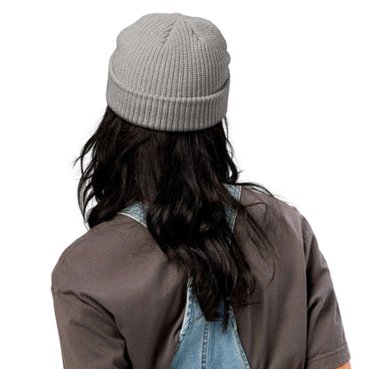 Back view of a person wearing a gray Fischermütze N°0 beanie, showcasing its thick ribbed knit and versatile fisher style.