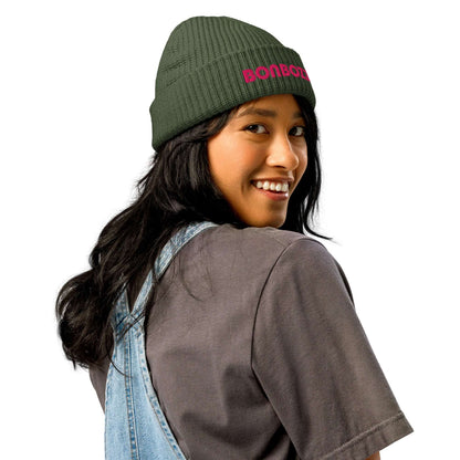 Woman wearing Fischermütze N°0 beanie, showcasing trendy, ribbed knit style ideal for cold weather.