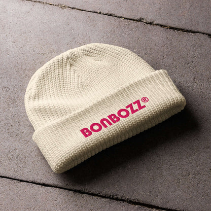 Cream knit beanie with "BONBOZZ" logo on the front