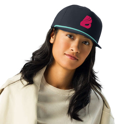 Woman wearing a stylish Golfcap with classic design, structured fit, and adjustable snapback closure.