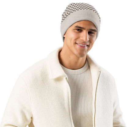 Person wearing a Gestrickte Mütze, soft and lightweight, perfect for cool days, made from 55% cotton and 45% polyester.