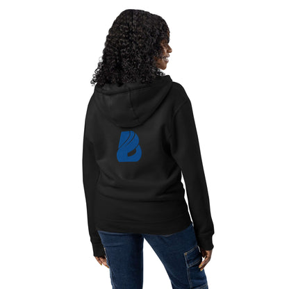 Alt Tag: Woman wearing a black Premium-Zip-Hoodie with a blue logo on the back, showcasing its versatility and comfort.