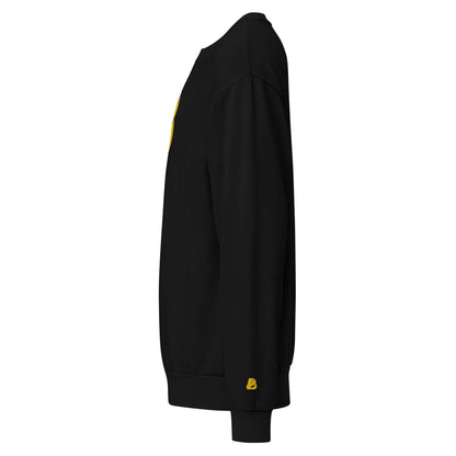 Urbaner Pullover in Schwarz mit Oversized-Fit und Rundhalsausschnitt, seitliche Ansicht. Perfekt für Streetwear-Looks, Komfort und Langlebigkeit.