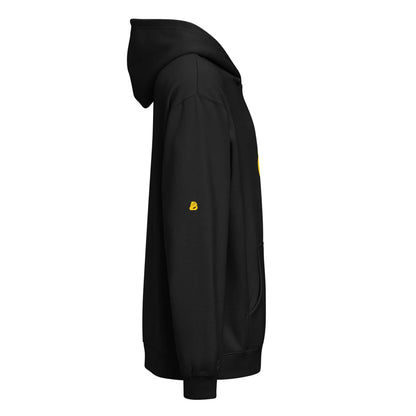 Boxy-Hoodie für Herren in Carbon Grey, oversized fit with deep shoulders, made from soft fleece blend, shown from side view.