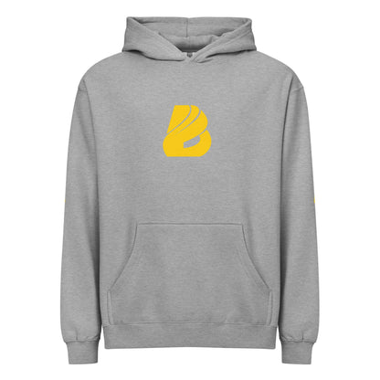 Grauer Boxy-Hoodie für Herren mit gelbem Logo, weiches Fleece, übergroßes Design, ideal für einen frischen Look.