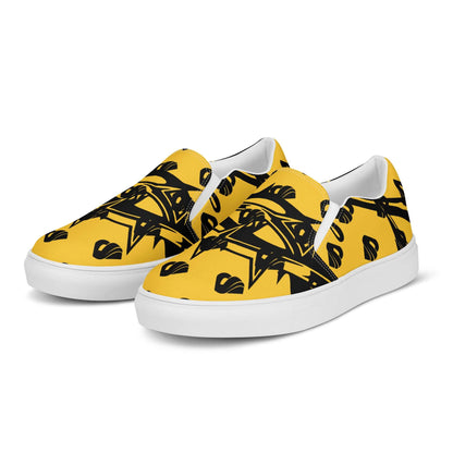Yellow Herren-Canvas-Slipper N°1 with black abstract patterns and white soles, designed for comfort and style.