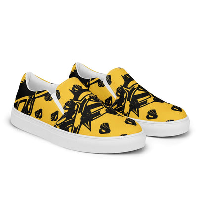 Herren-Canvas-Slipper N°1 with removable soft insoles, lightweight canvas design, EVA rubber sole, stylish yellow and black pattern.