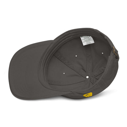 Inside view of Bio-Dad Hat N°1 made from 100% organic cotton showing tag and stitching details.