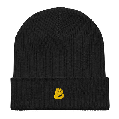 Gerippte Bio-Beanie aus 100% Bio-Baumwolle, schwarz mit gelbem Logo, umweltfreundlich, stylisch, und atmungsaktiv für drinnen und draußen.