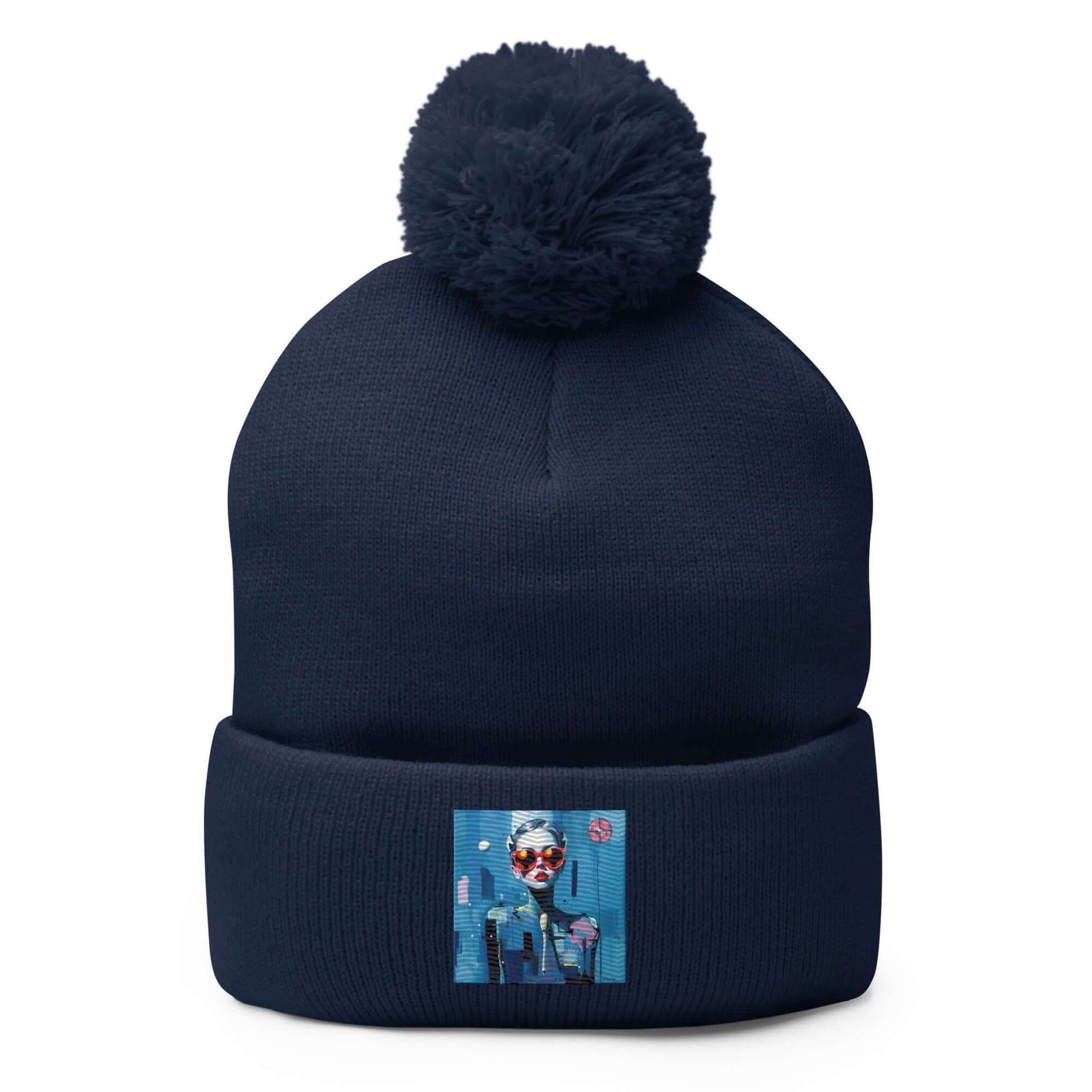 Navy blue Bommelmütze with embroidered graphic and pom pom, made of 100% acrylic, ideal for cold weather fashion.