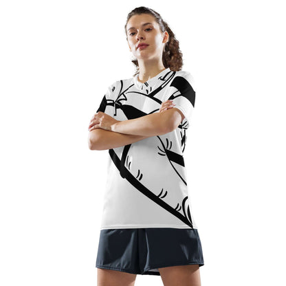 Person modeling a Recyceltes Unisex-Trikot mit Allover-Druck, featuring breathable and moisture-wicking recycled polyester fabric.