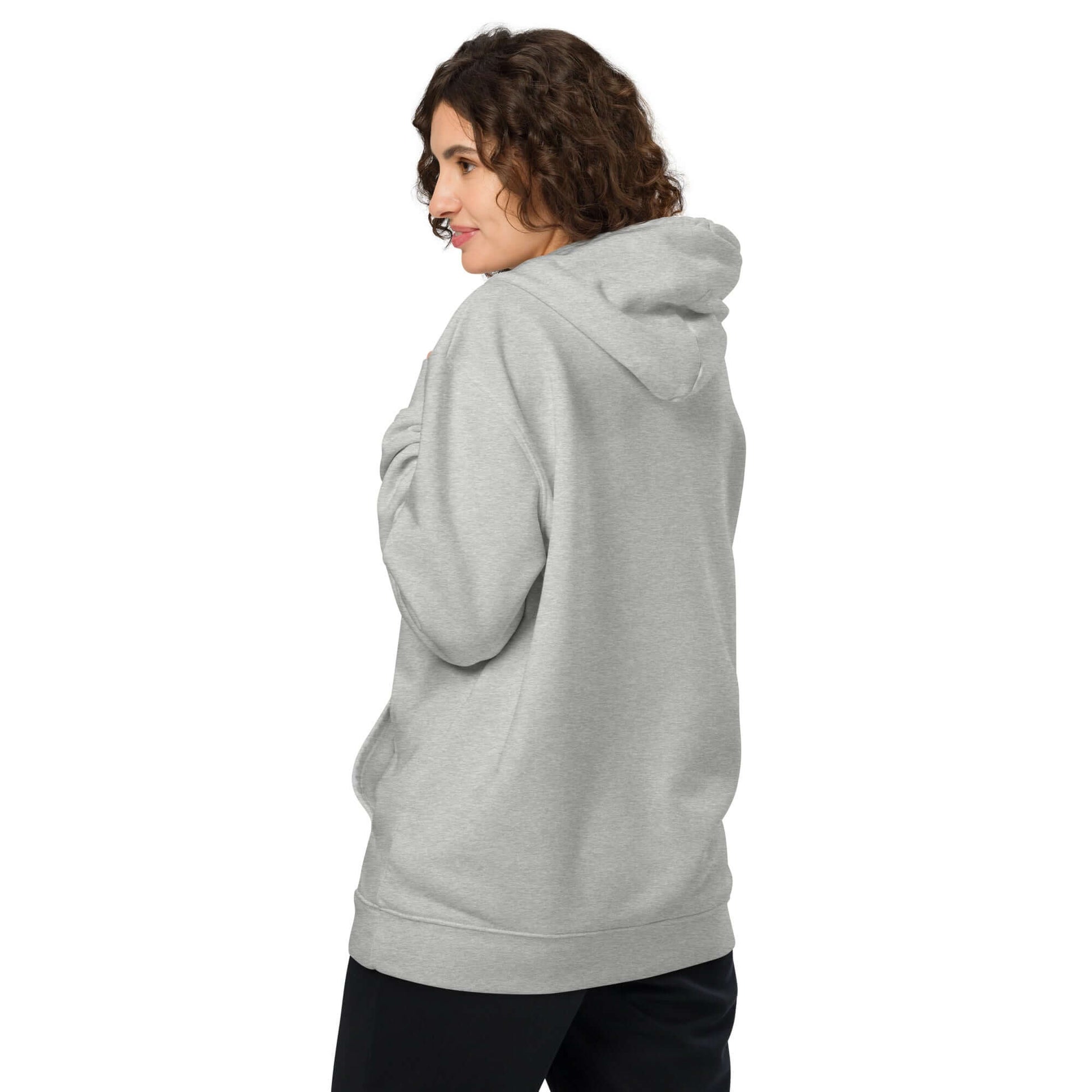 Unisex bio-hoodie in gray, showcasing the back view on a model with curly hair.
