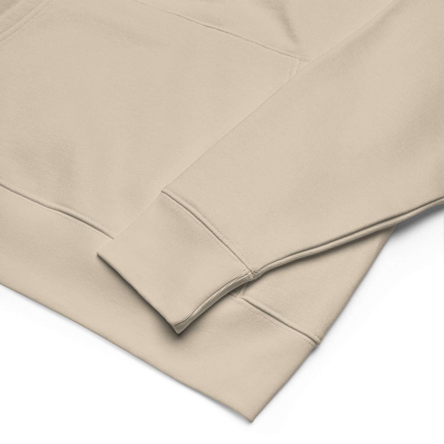 Detail view of the beige unisex bio-hoodie showcasing the high-quality fabric and cuff design.