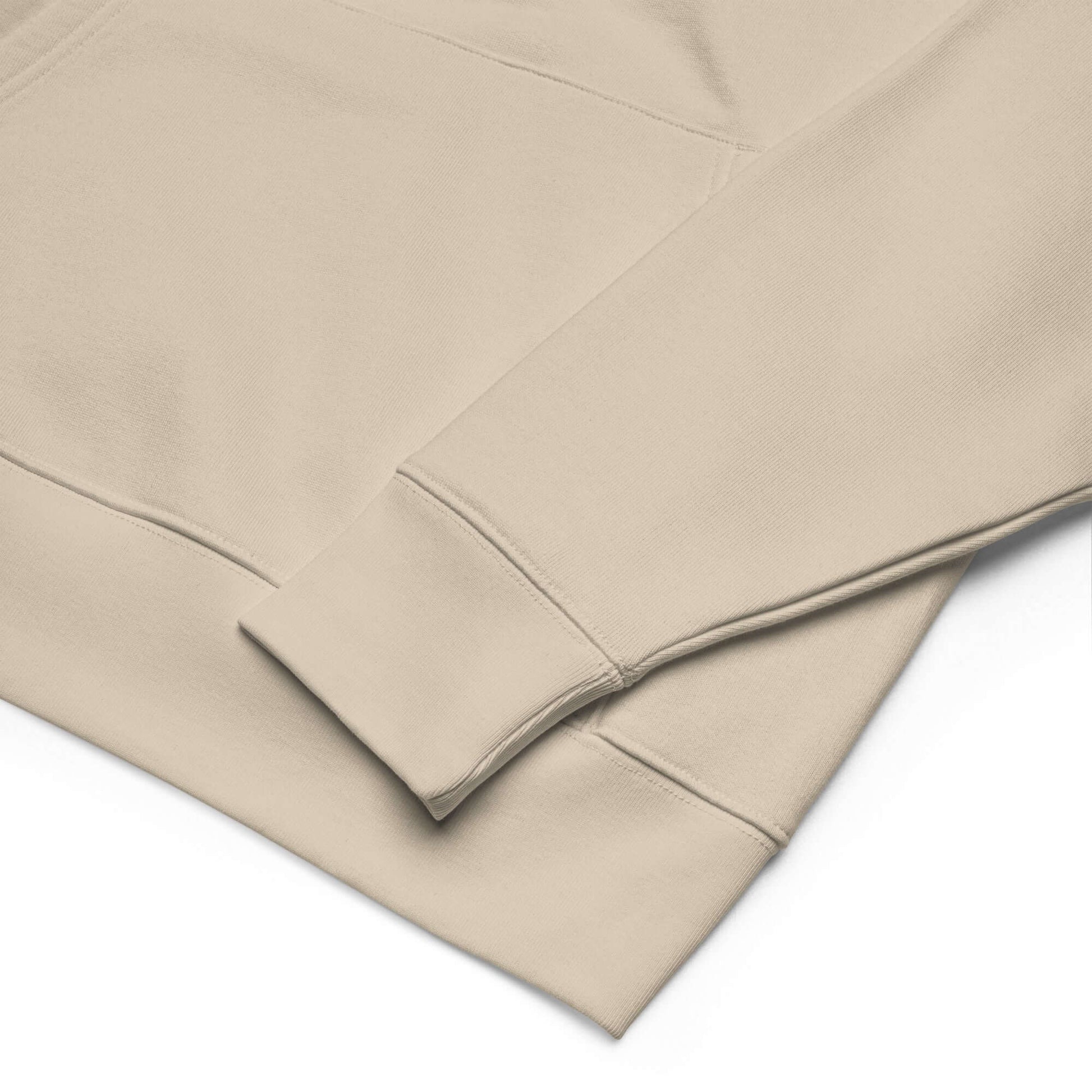 Detail view of the beige unisex bio-hoodie showcasing the high-quality fabric and cuff design.