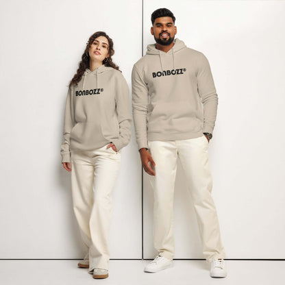 Models wearing Unisex Bio-Hoodie in beige with kangaroo pocket and hood, showcasing eco-friendly fashion.