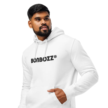 Model wearing white Unisex Bio-Hoodie made from organic cotton and recycled polyester with kangaroo pocket and double-layered hood.