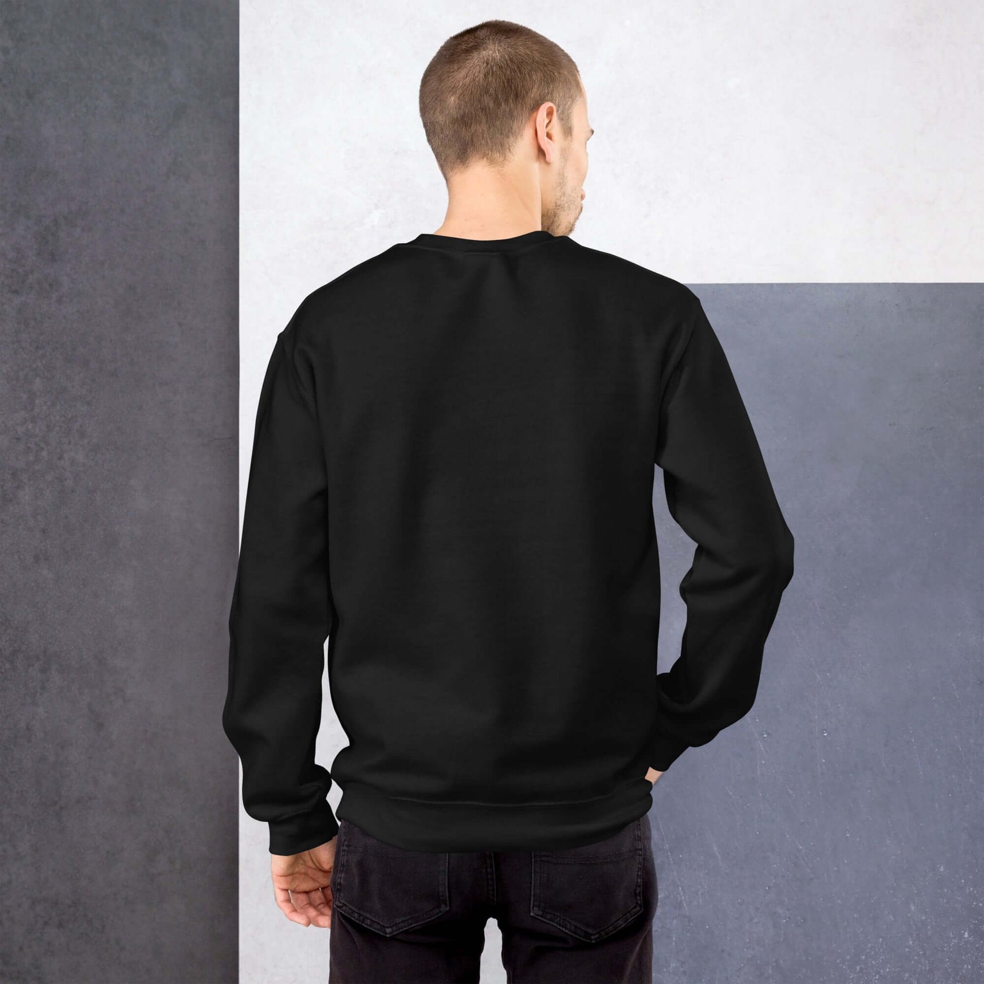 Back view of a classic black Unisex-Pullover, highlighting soft Airjet yarn and pre-shrunk cotton-poly blend for warmth.