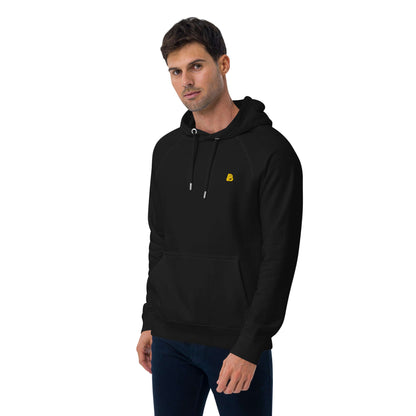 Model wearing Unisex Bio-Raglan-Hoodie N°5 in black, showcasing its comfort and style.