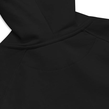 Close-up of black Unisex Bio-Raglan-Hoodie N°3 with hood and soft inner lining